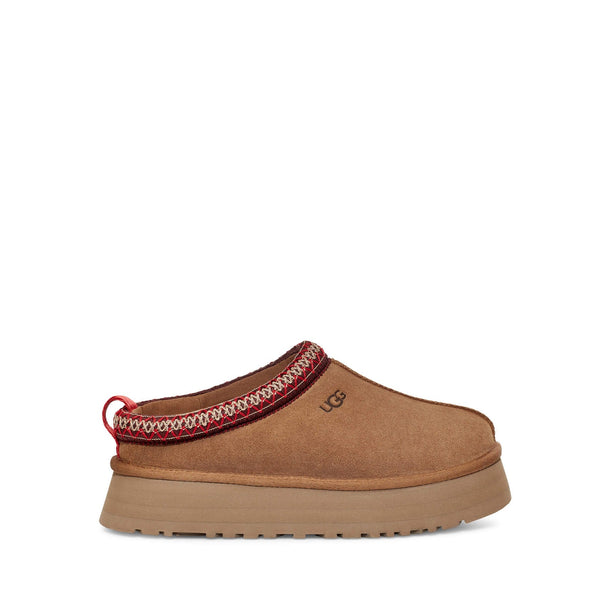 Brown suede slip-on shoe with red stitching and thick rubber sole.