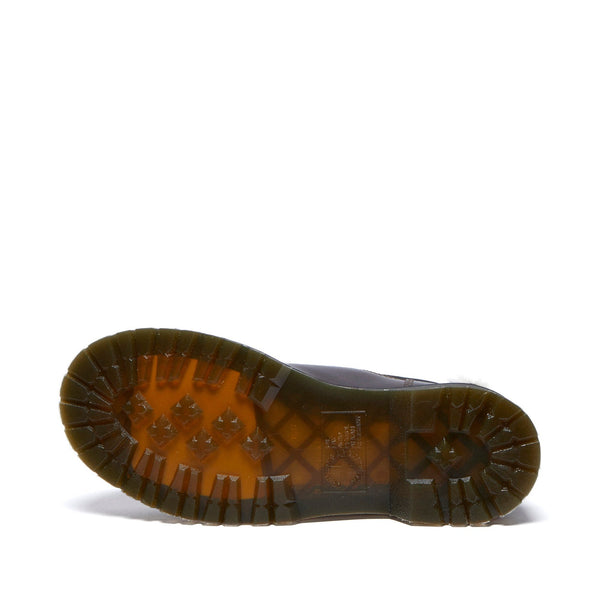 A sole of a shoe with a tread pattern on a white background.