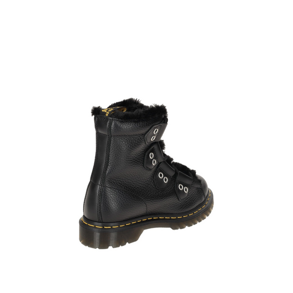 Black leather boot with fur lining and yellow stitching on a white background.