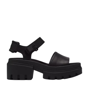 Black platform sandal with chunky sole and ankle strap.