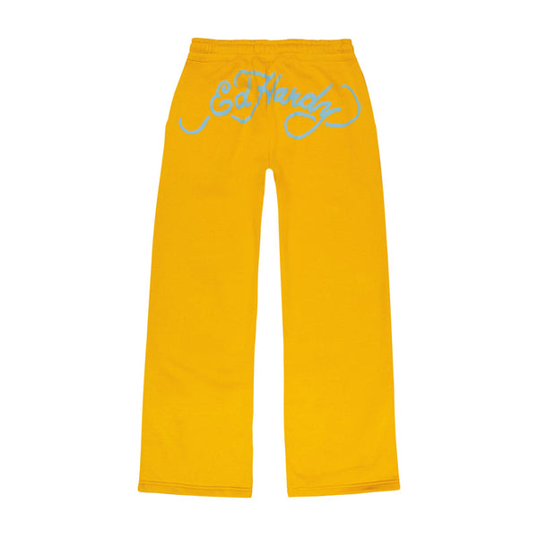 Yellow sweatpants with a blue "Ed Hardy" script logo across the back.