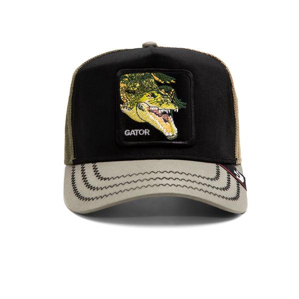 Black and tan baseball cap with an embroidered alligator patch.