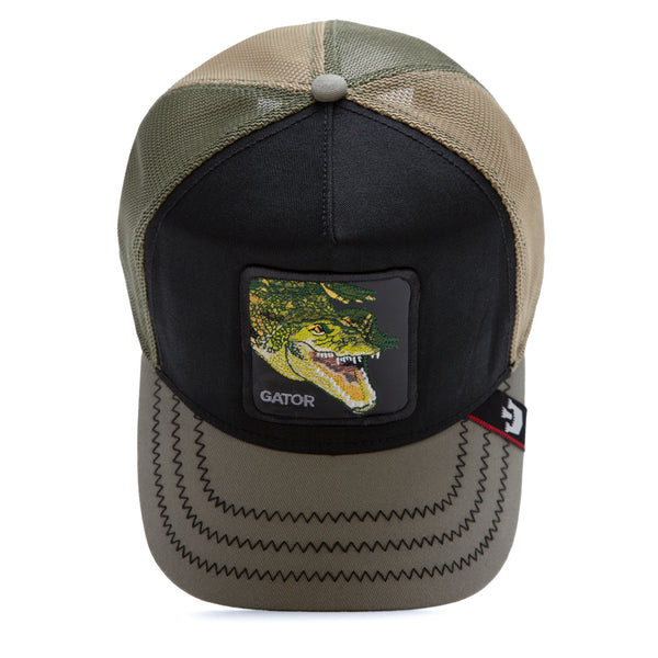 Trucker hat with a camo design and alligator patch on the front.