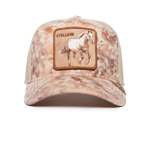 A copper distressed colored baseball cap with a horse patch emblem and the word 