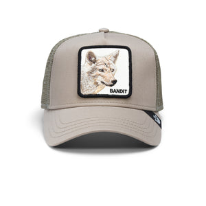 A beige and green baseball cap with a patch depicting a fox and the word 