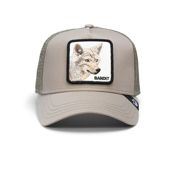 A beige and green baseball cap with a patch depicting a fox and the word "BANDIT".