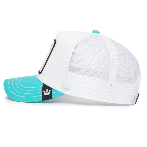 White and turquoise cap with an owl patch labeled "WHITE GIRL".