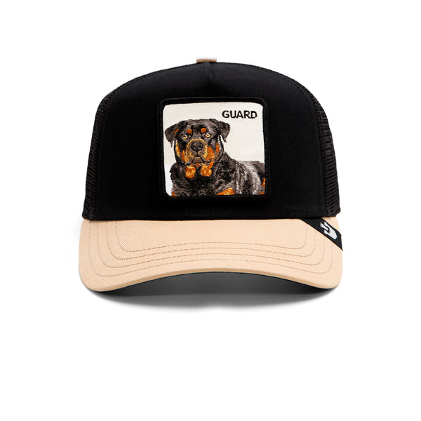 A trucker hat with a patch featuring a Rottweiler labeled "GUARD" on a white background.